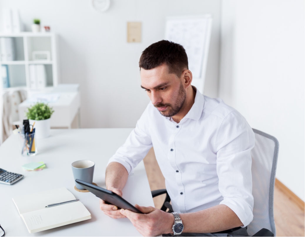 businessman with tablet pc at office