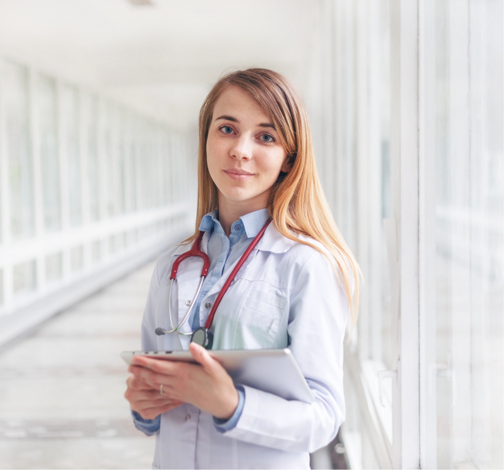 young female doctor with tablet computer TD9HBLE@2x